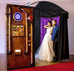 Vintage steampunk rustic wedding photo booth rental.
