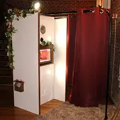 Elegant white wedding or party photo booth rental