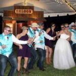 Bridal dance rustic wedding with the western saloon photo booth rental. Bridal dance rustic wedding with the western saloon photo booth rental.