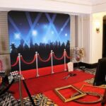 Hollywood movie themed red carpet photo booth rental