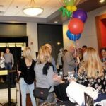 Uptown Theater corporate fundraiser party gold frame photo booth