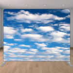 blue sky clouds photo booth backdrop