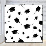Graduation party cap and gown photo booth backdrop