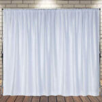 elegant white velvet draped curtain panels backdrop