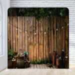 Rustic wood backyard deck photo booth wedding party backdrop
