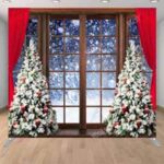 Living room windows red curtains white trees Christmas holiday photo booth backdrop